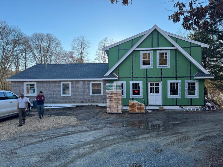 Cape Cod home addition under construction by Custom Crafted Homes