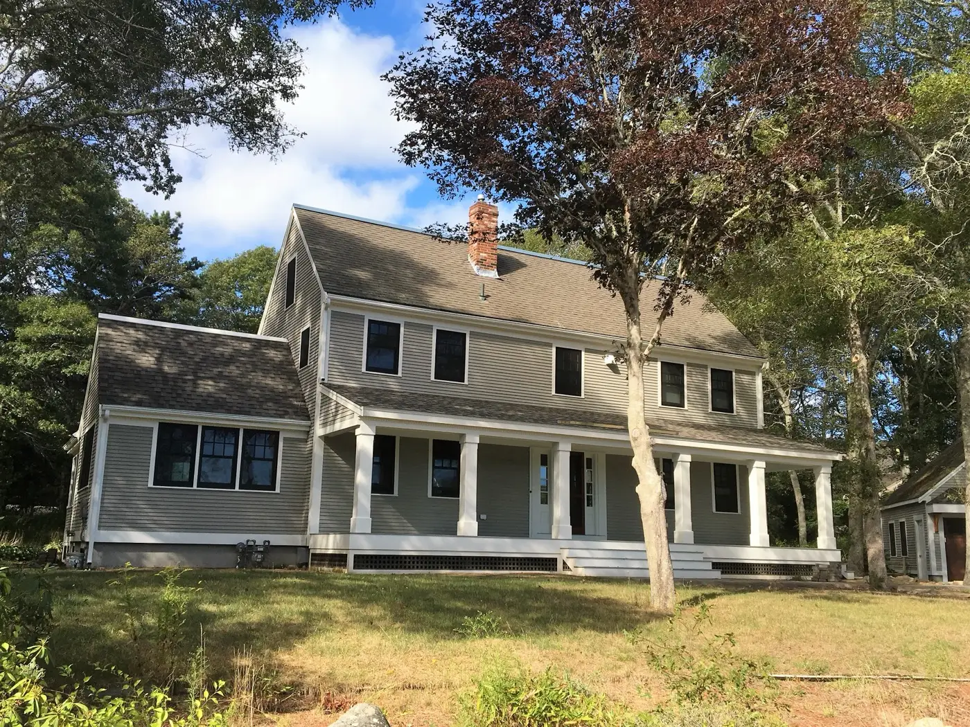 Building a house in Massachusetts — a completed custom colonial home on Cape Cod