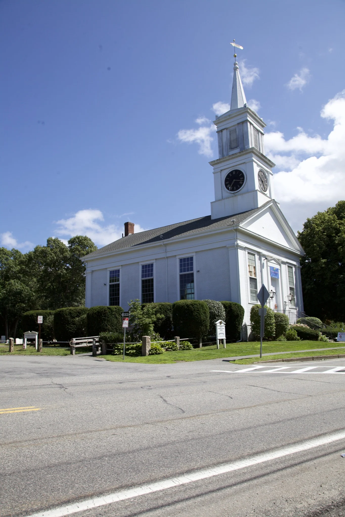 White village church seen along the road in Centerville, Barnstable