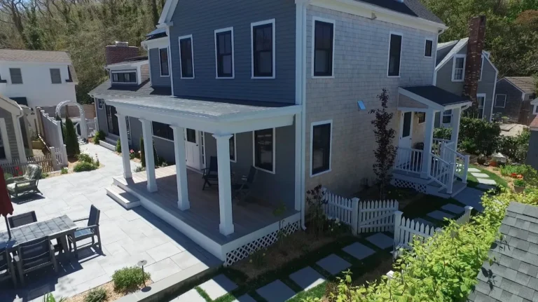 Historic home renovation on Cape Cod — a classic shingled home with a farmer's porch