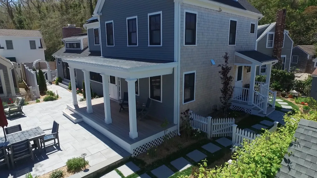 Historic home renovation on Cape Cod — a classic shingled home with a farmer's porch