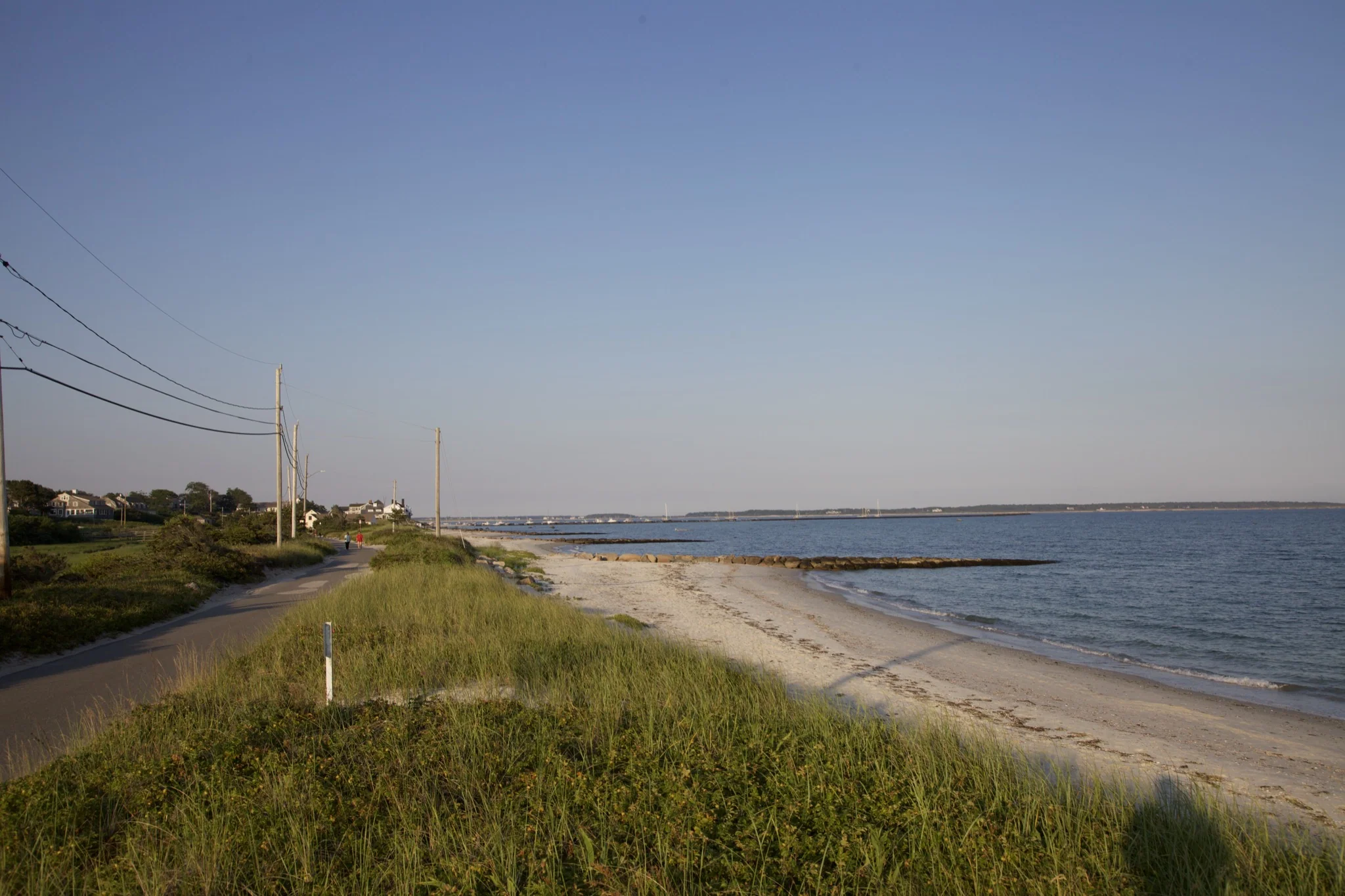 Shore road running alongside the beach at Hyannis Port on Cape Cod