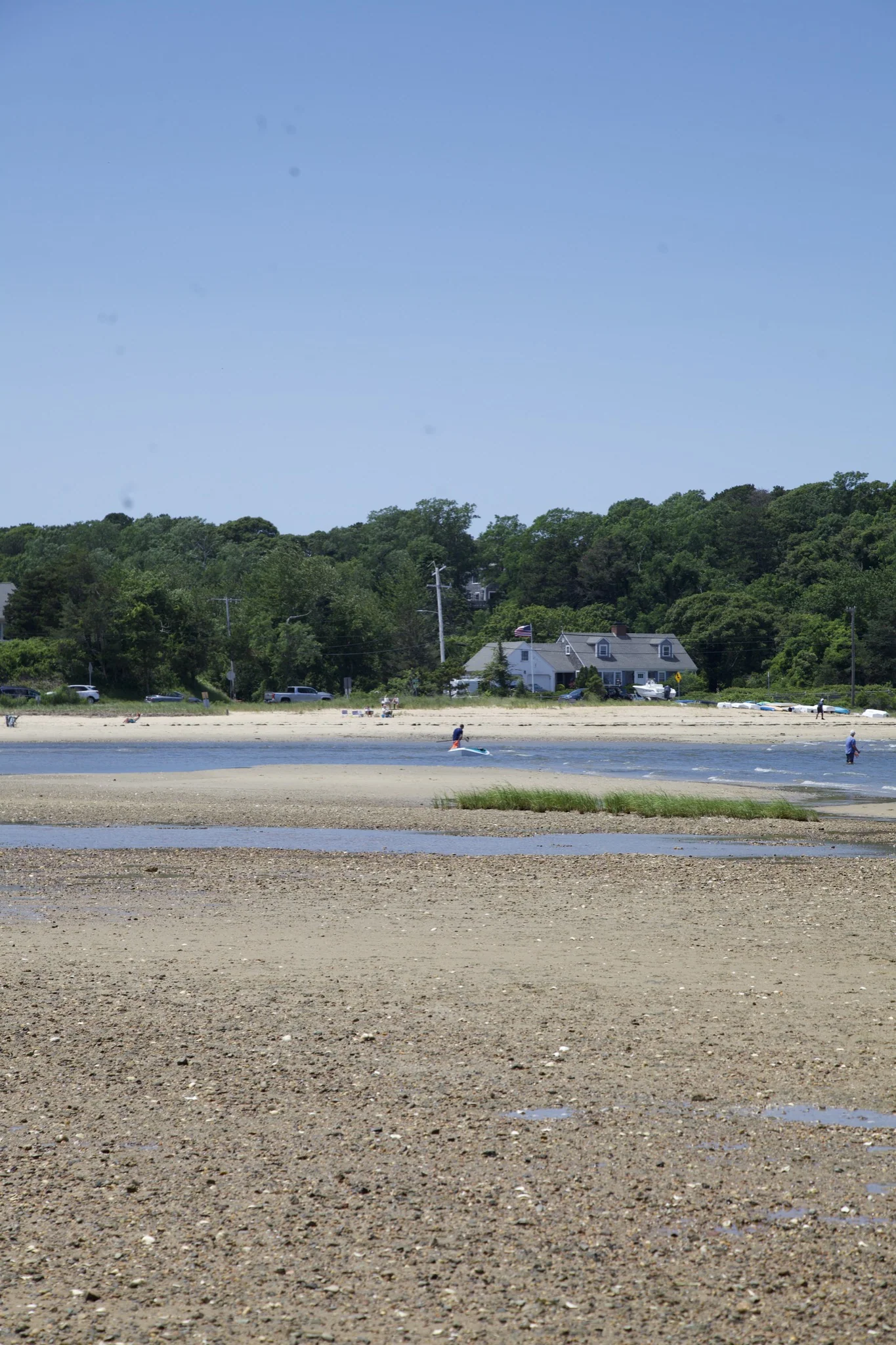 House on the far shore seen across the tidal flats in Chatham, Massachusetts
