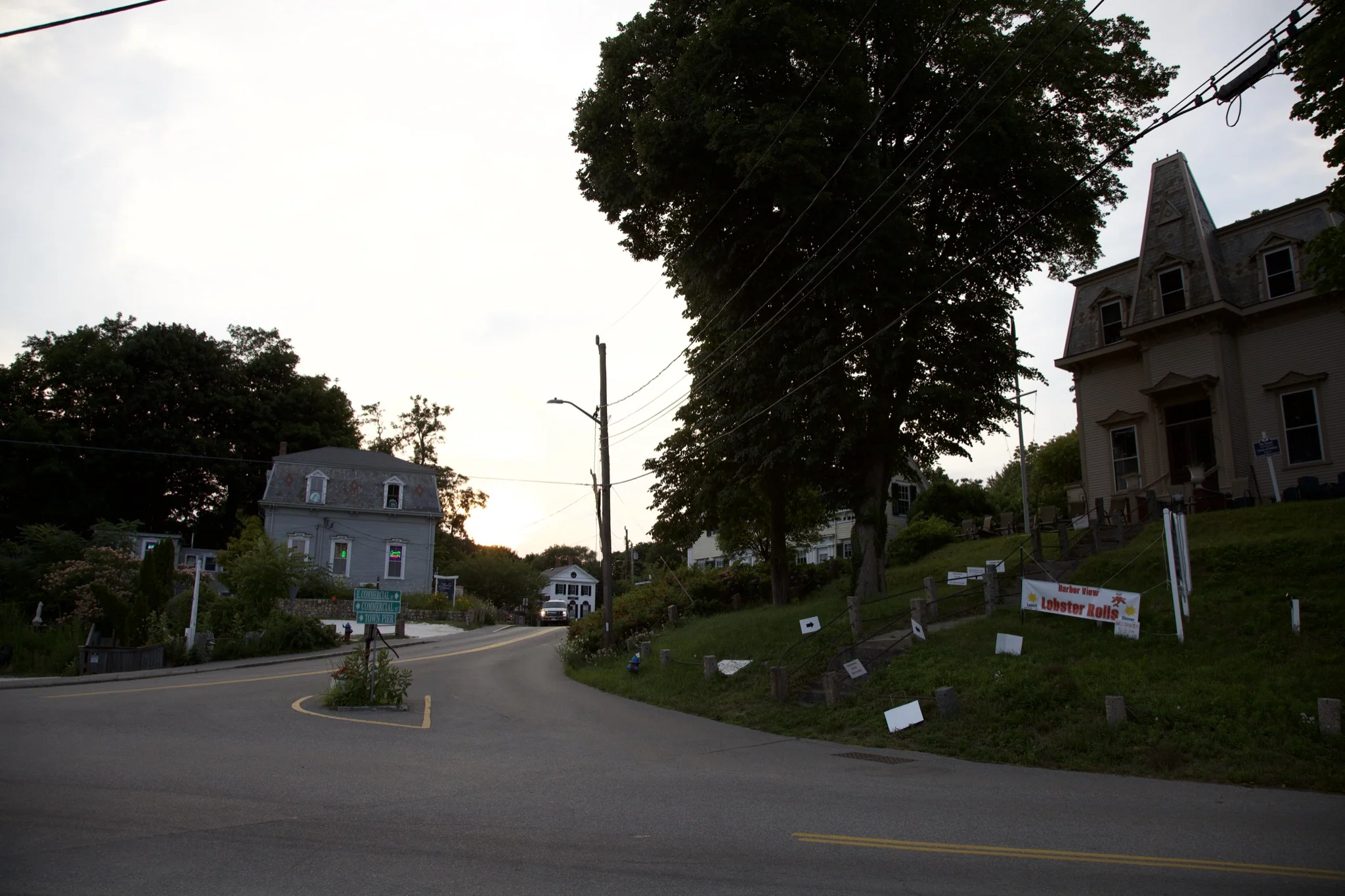 Clapboard village houses at the bend of the road in Wellfleet centre